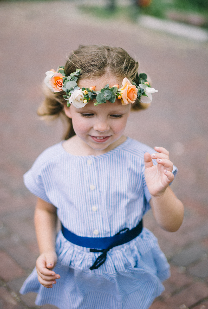 Flower girl in blue seersucker dress