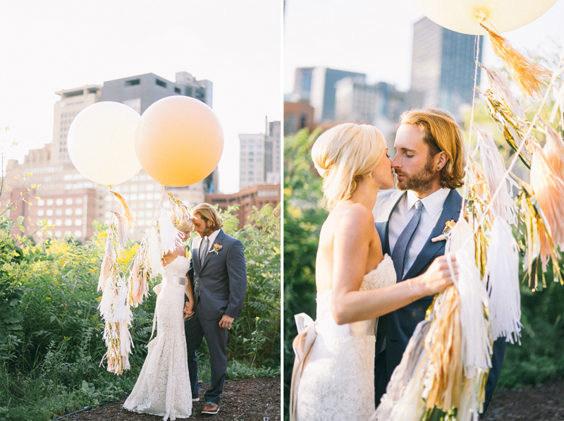 bride and groom with st paul skyline