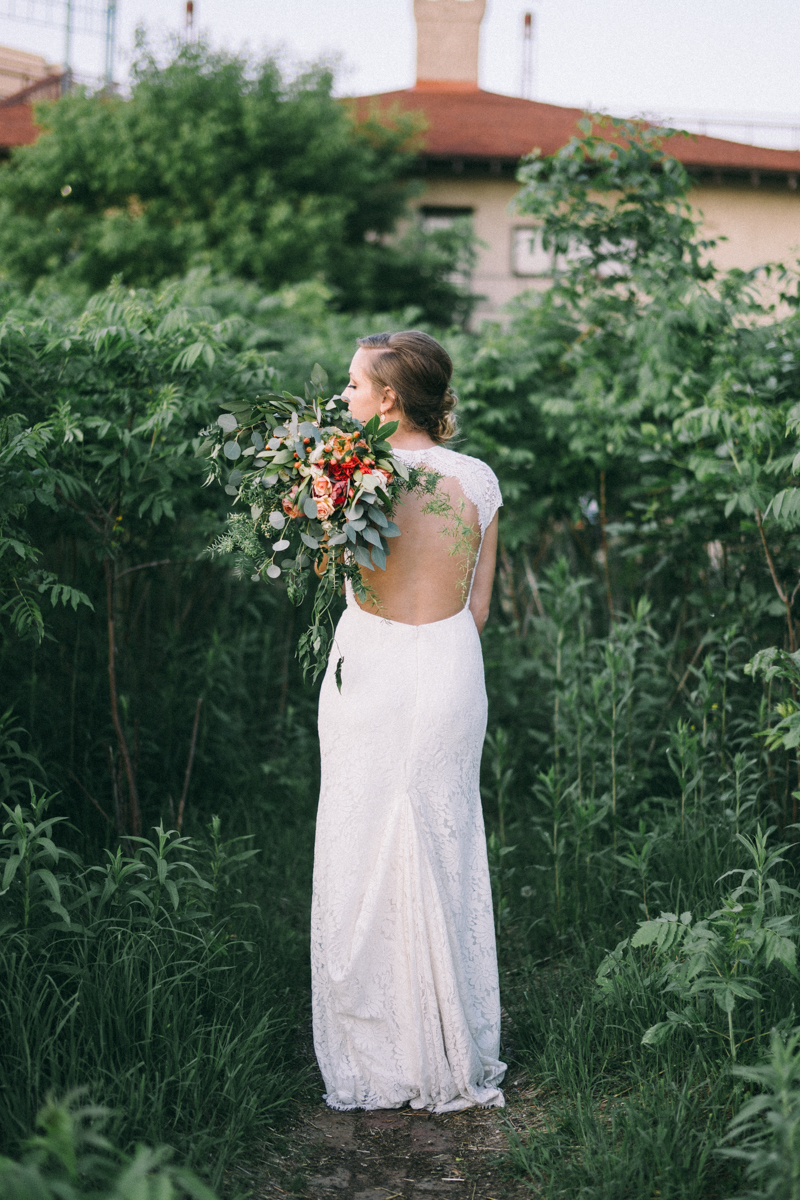 Bride with bouquet in st paul woods