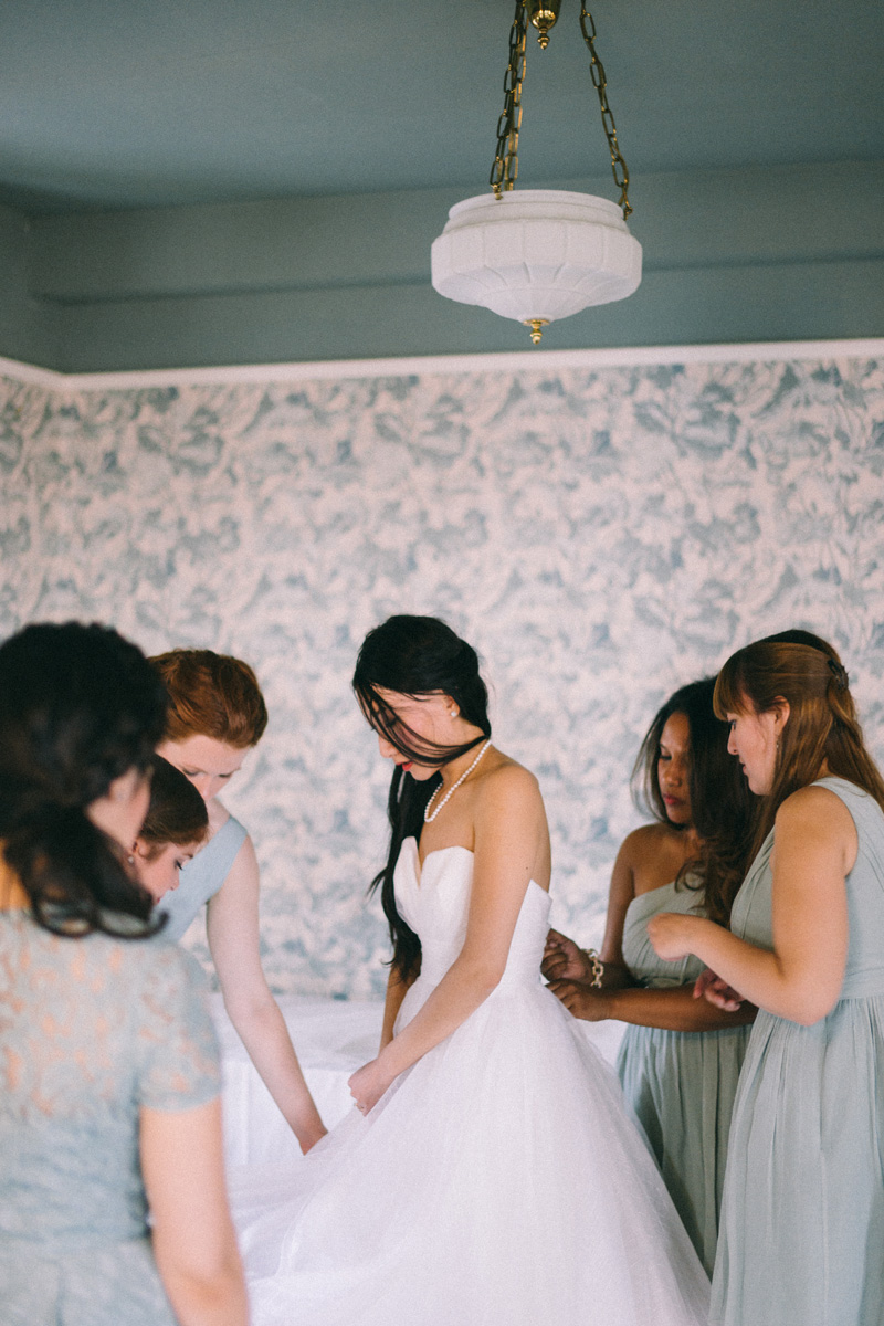 St Paul Athletic Club winter wedding getting dress on