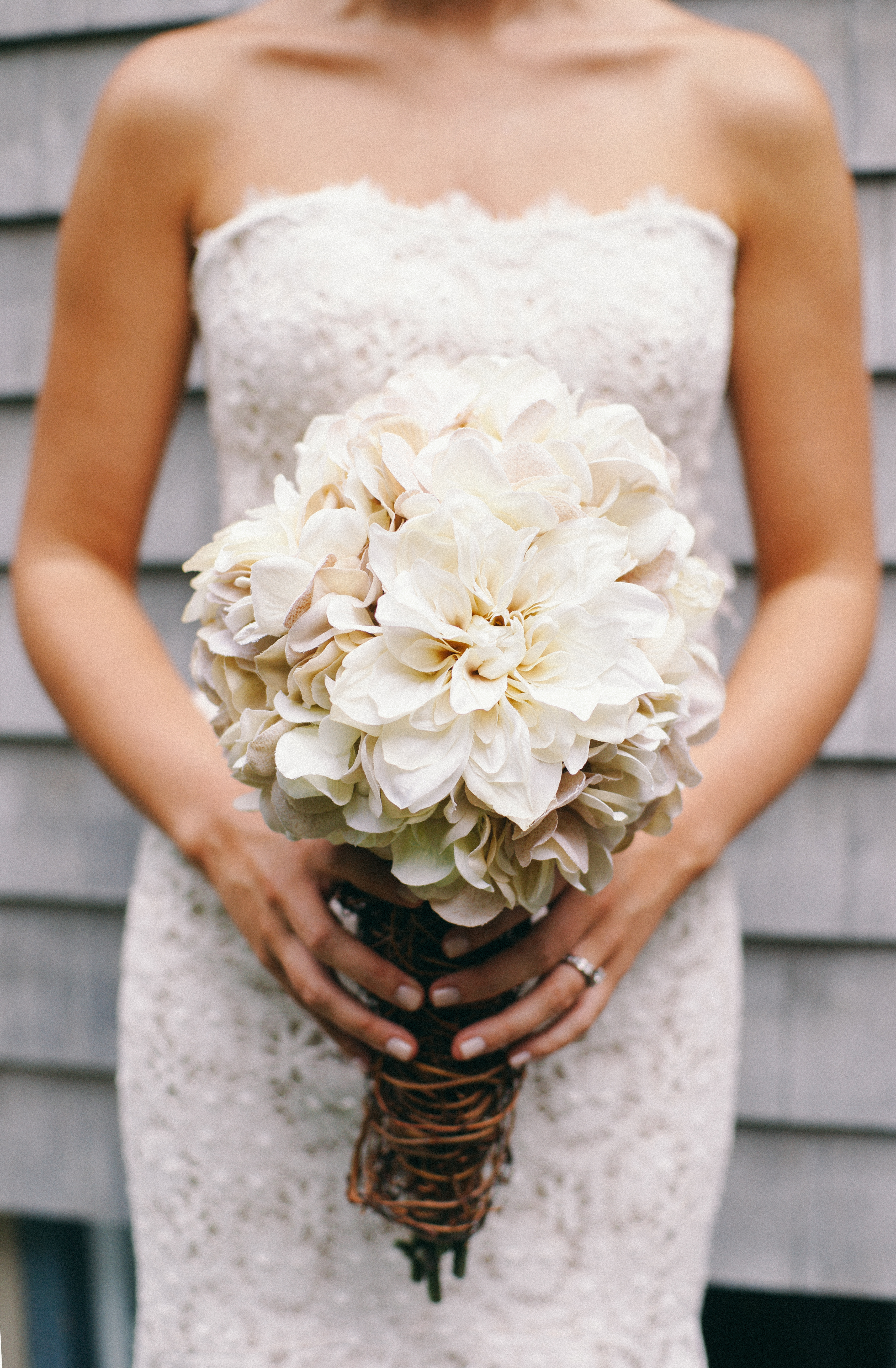 rustic wedding bouquet and lace dress