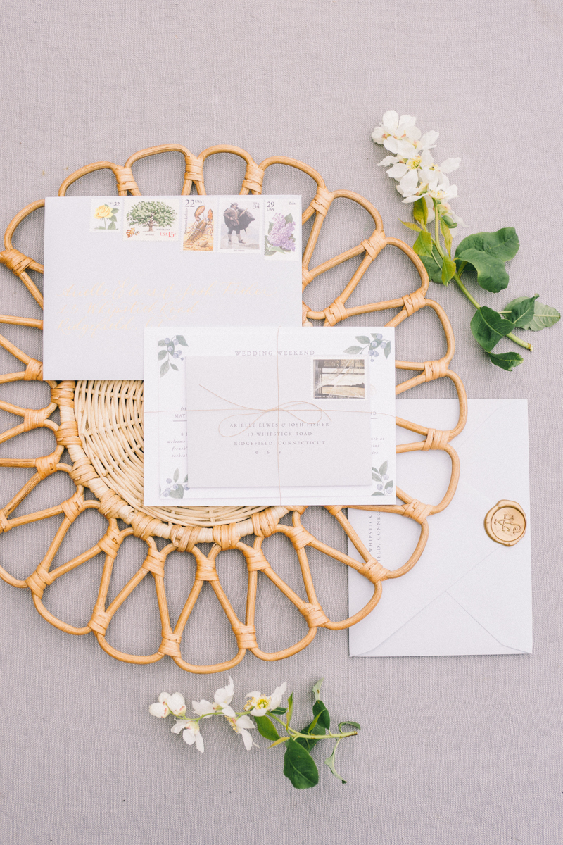 rattan inspired wedding flat lay