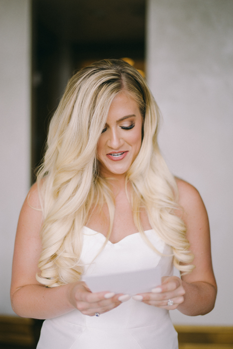 bride reading wedding note