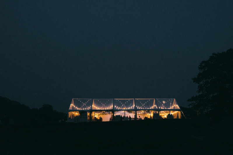 clear tent wedding at night