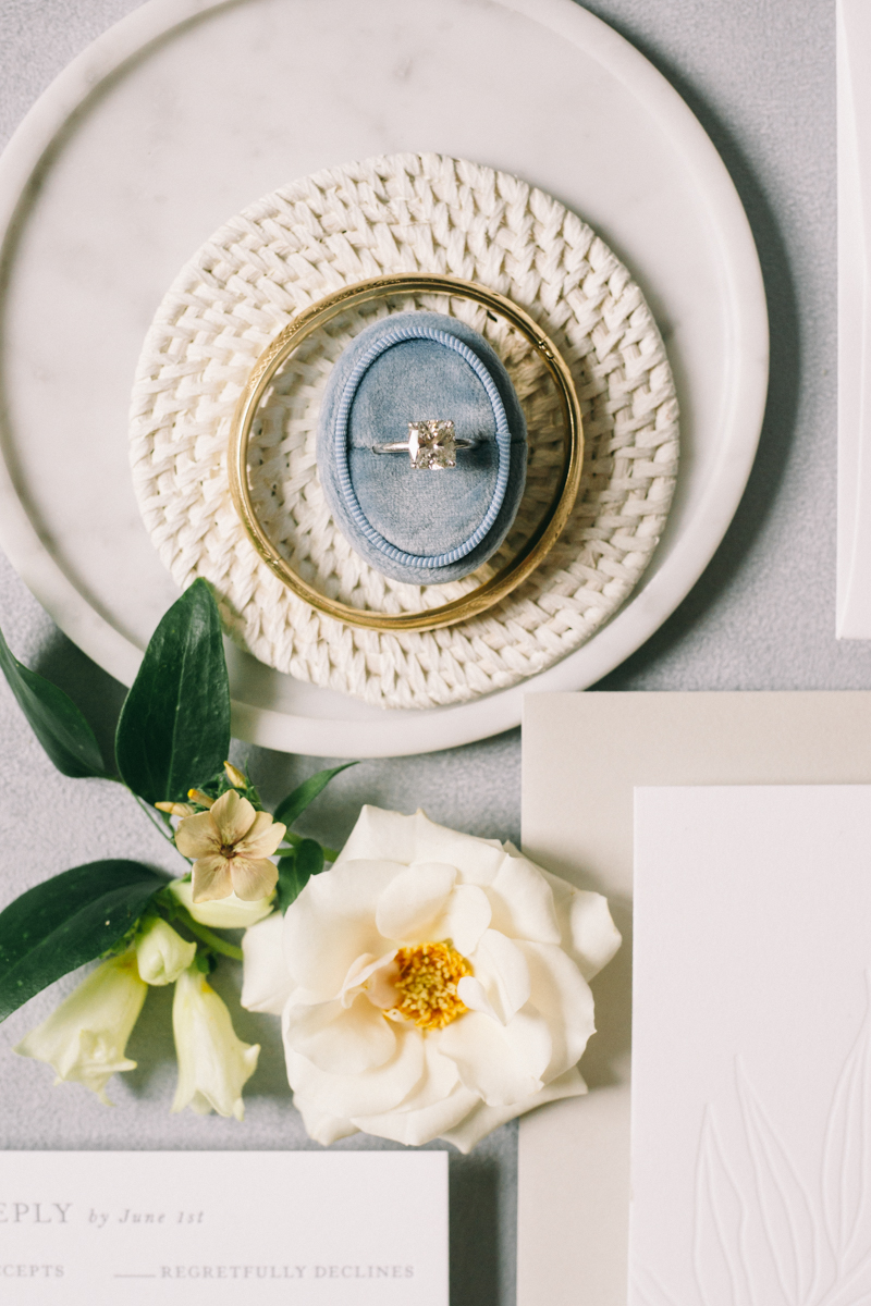 seaside flat lay wedding details