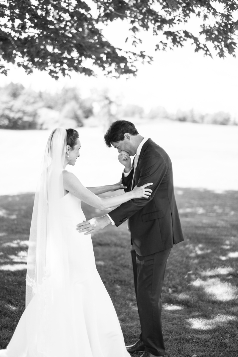 bride and groom first look at north haven golf course