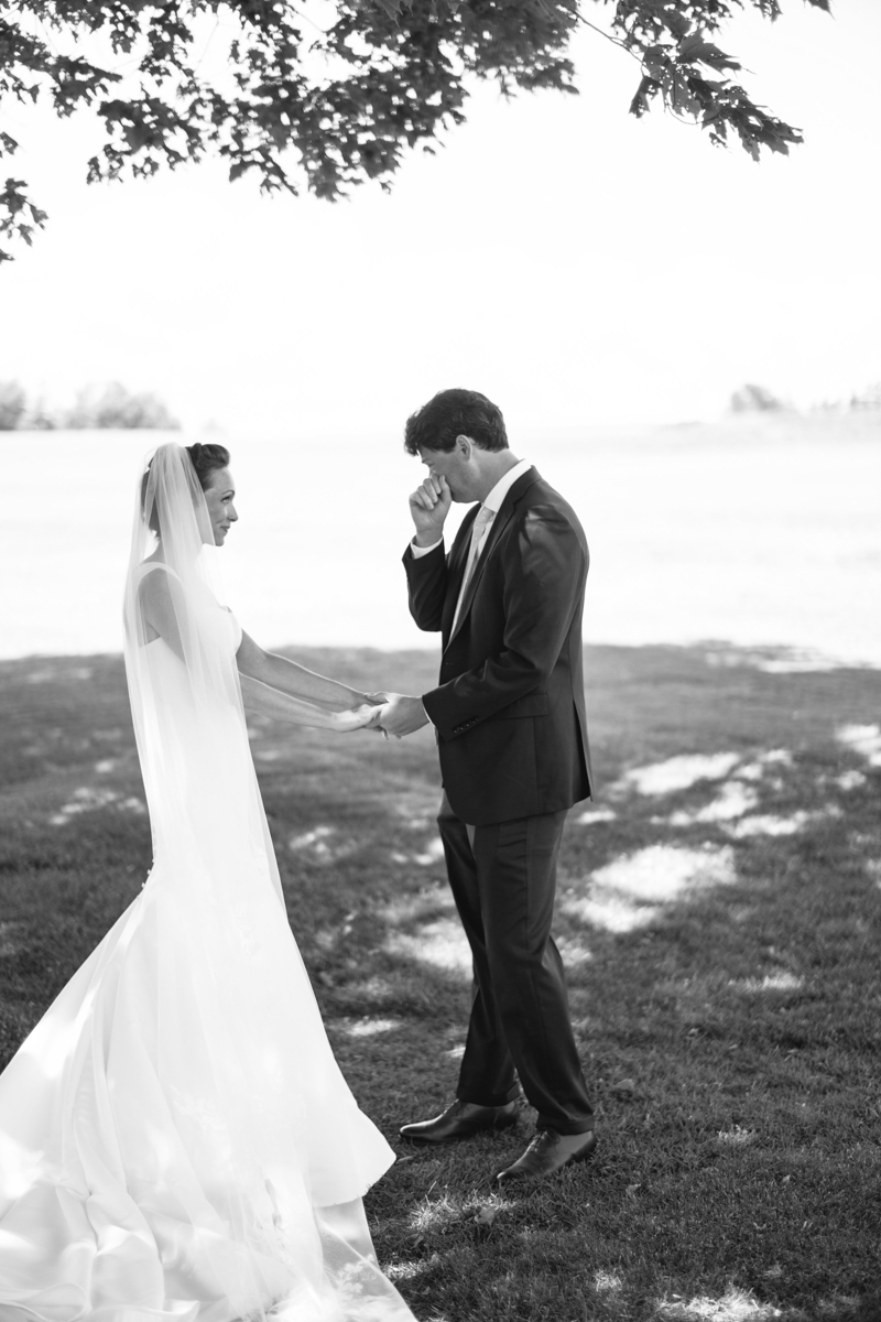 bride and groom first look at north haven golf course