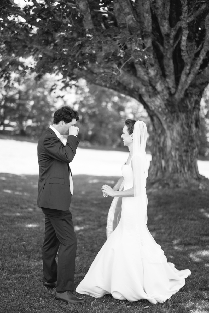 bride and groom first look at north haven golf course