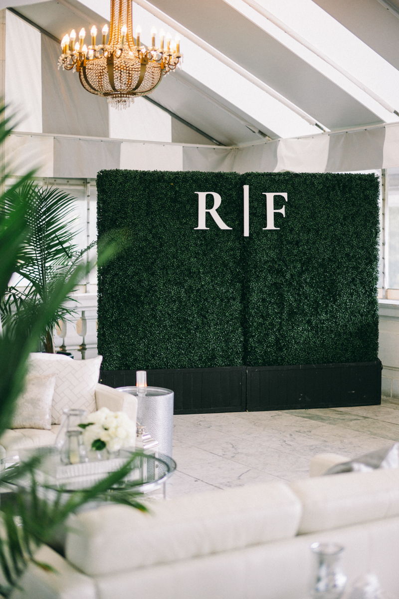 boxwoods at wedding with monogram