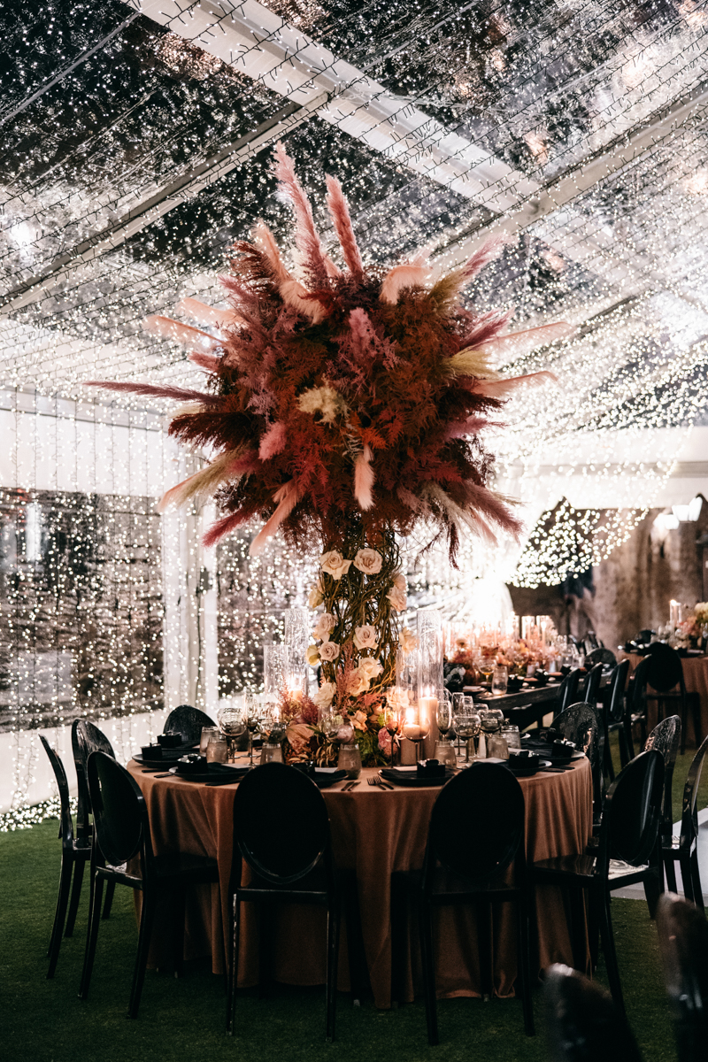 twinkle tent with disco balls and dried floral