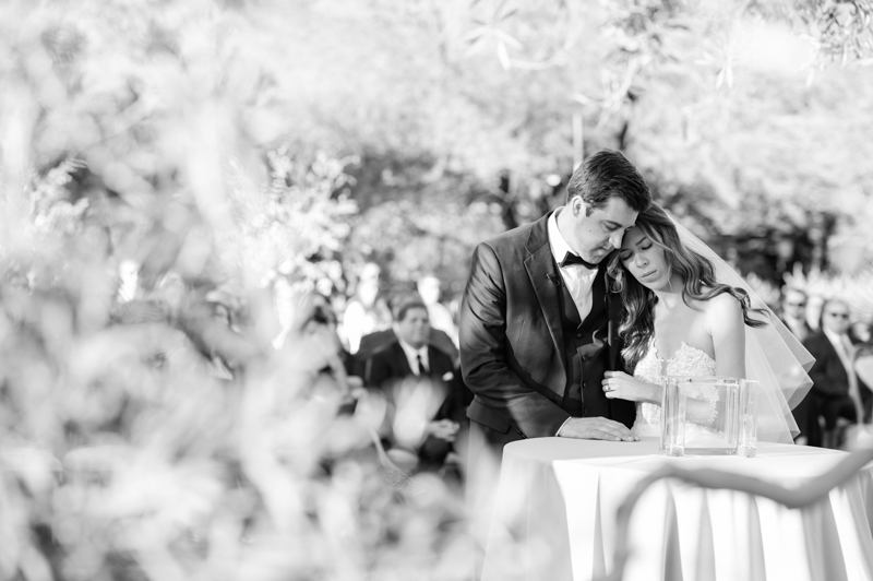 praying together at ceremony