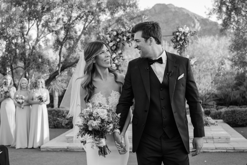 processional with flower petals at desert wedding