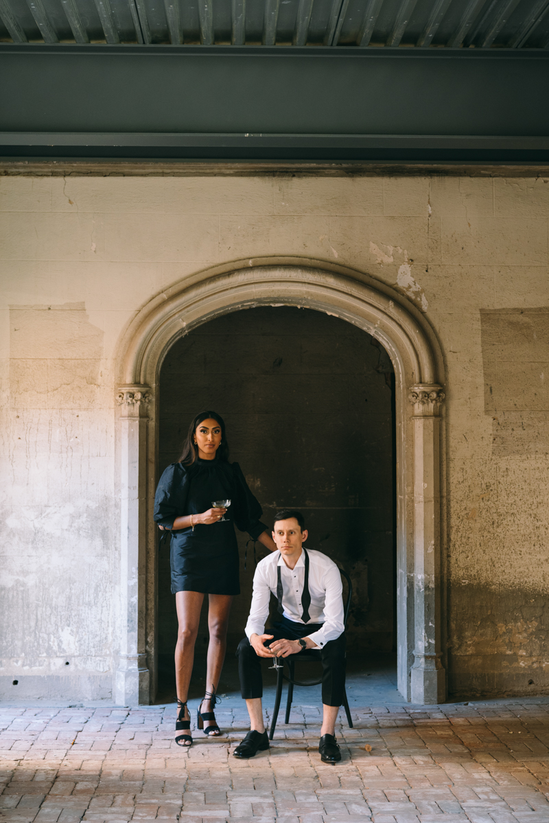 champagne toast in engagement photos