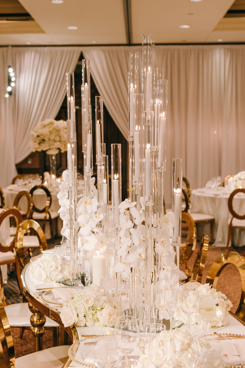 white orchids and white roses wedding with gold accents