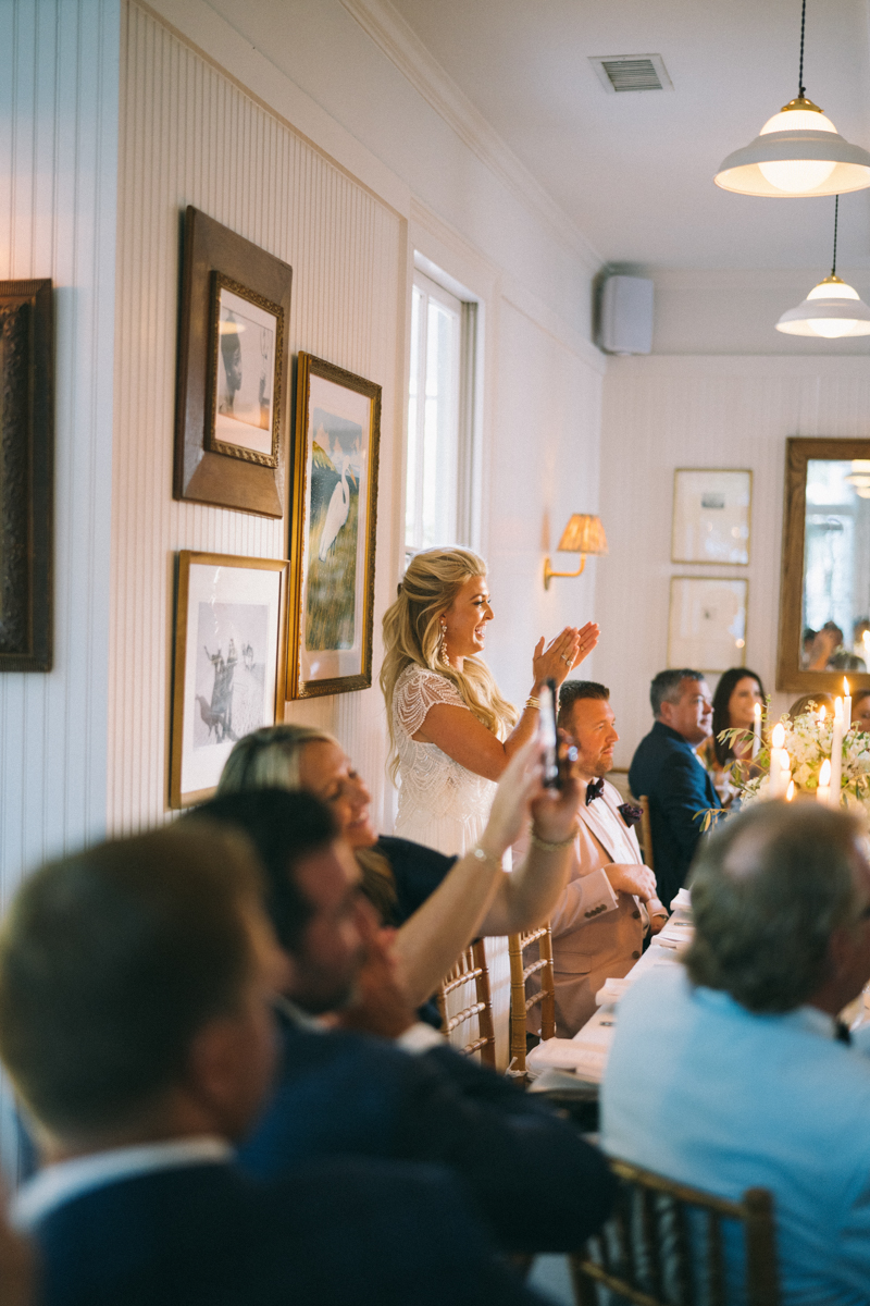 Luxury Wedding Reception bride is clapping hands and smiling 