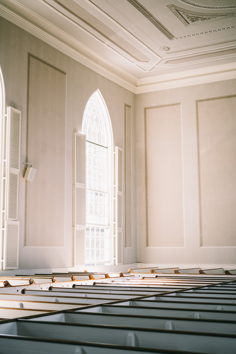 soft light and high walls in an empty church