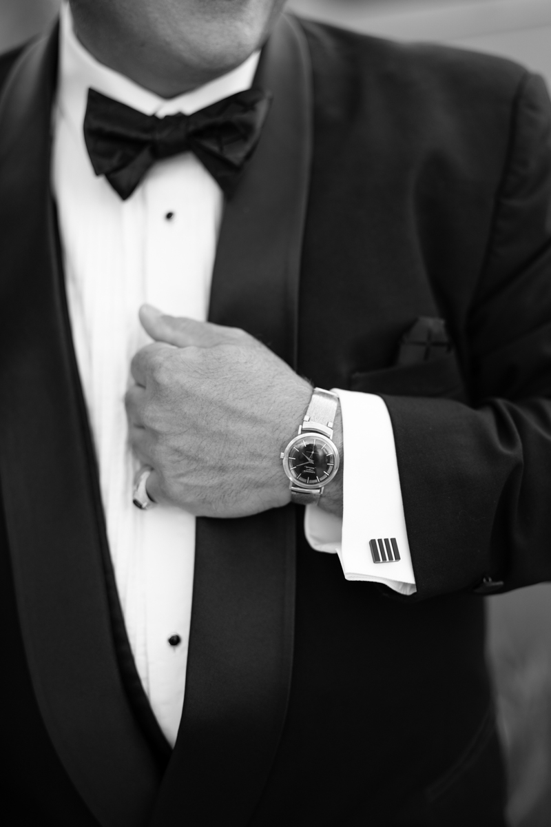 groom tuxedo showing watch and cufflinks