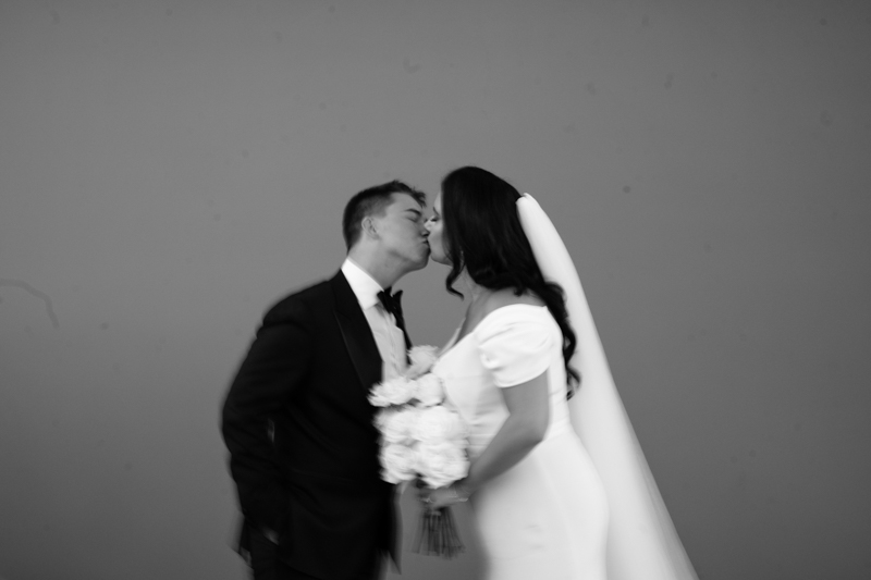 The bride and groom sharing a kiss after the ceremony