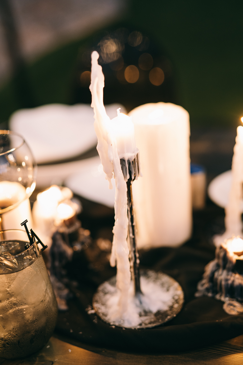 melted candle on wedding reception table