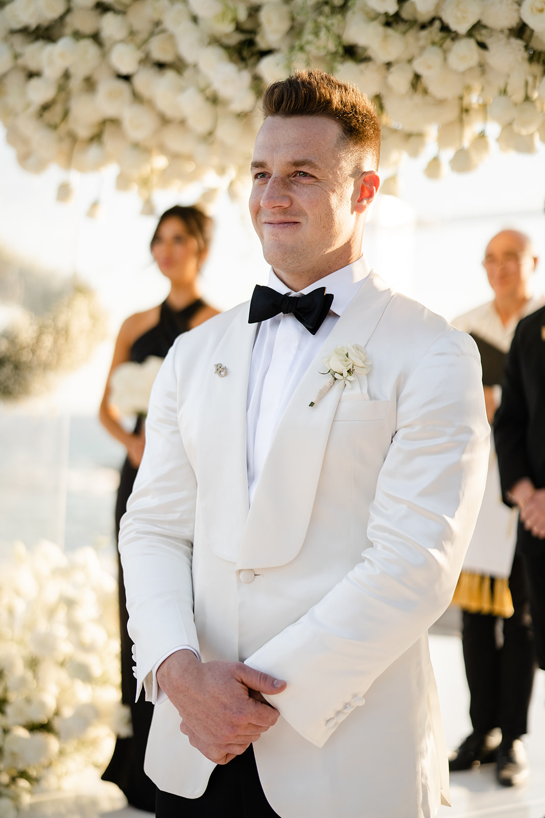 groom waiting for bride at ceremony in Cabo
