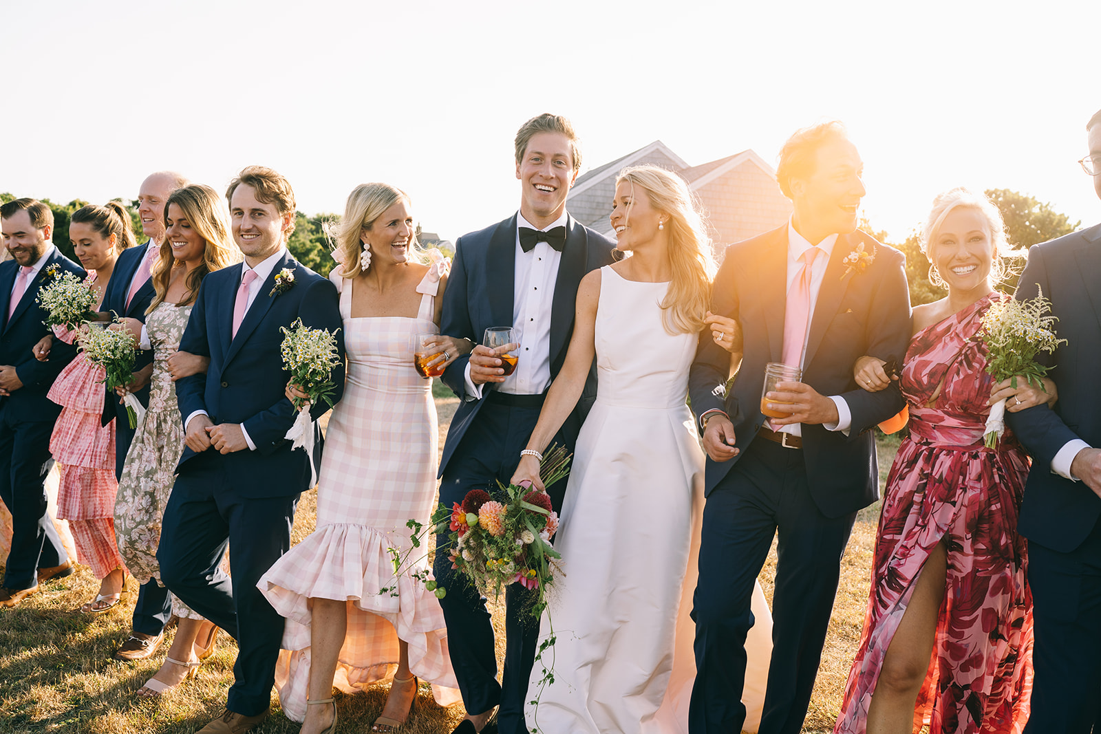 Wedding party in colorful clothing at Nantucket wedding