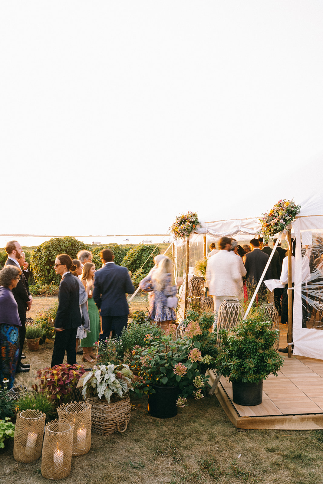 Wedding guests enjoying reception along the Nantucket coastline