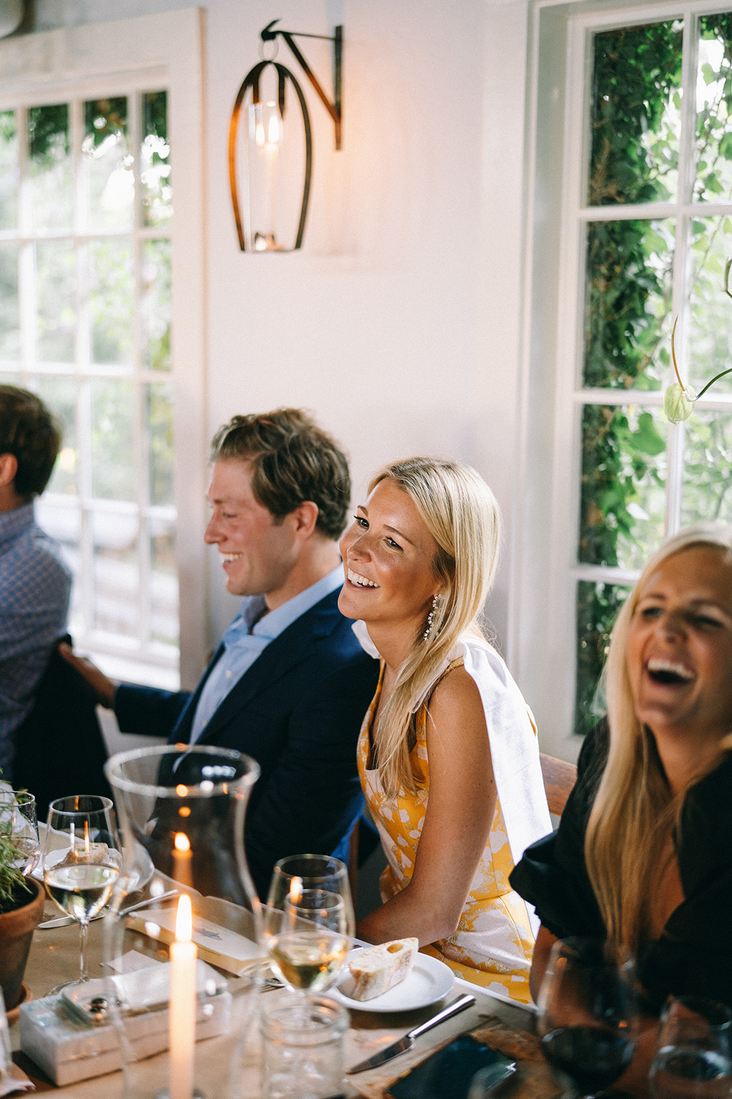 Couple smiling and looking across the room 