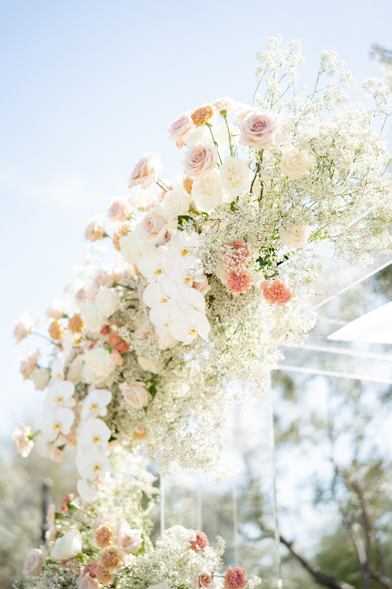 white and pink ceremony florals