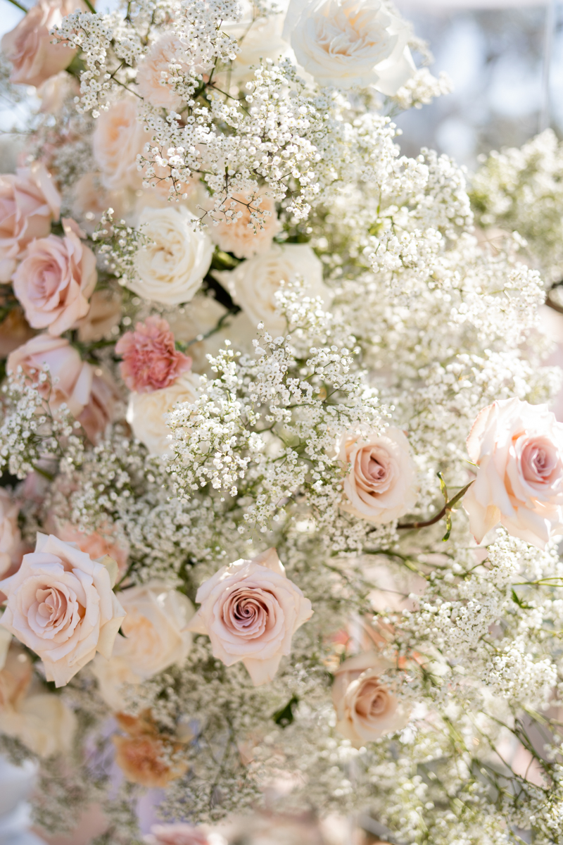 white and pink ceremony florals
