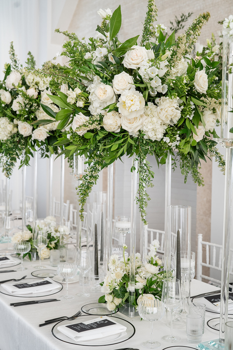 reception florals green and white at belle mer