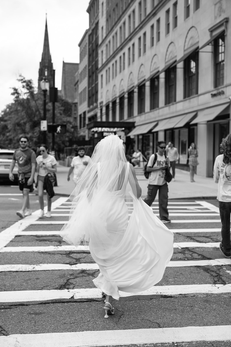 bride crossing the street in Boston