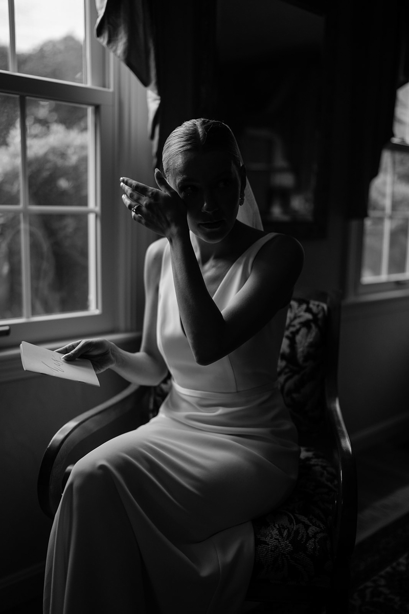 bride reading note from groom