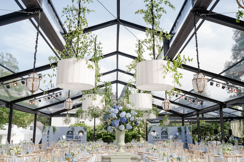 black tent structure wedding reception
