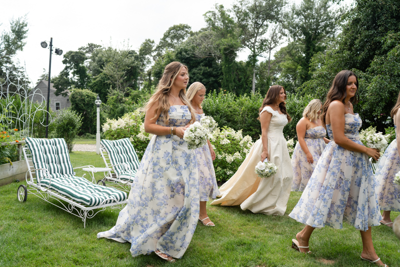 bridesmaids in garden with hydrangea dresses