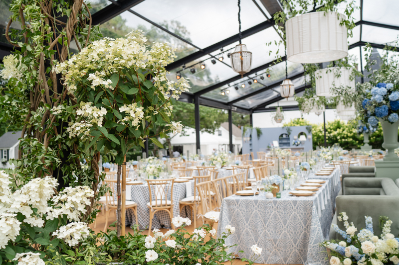 black steal tent wedding structure with cape cod garden aesthetic 