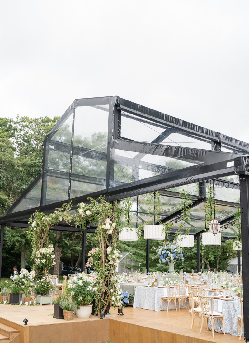 black steal tent wedding structure with cape cod garden aesthetic 