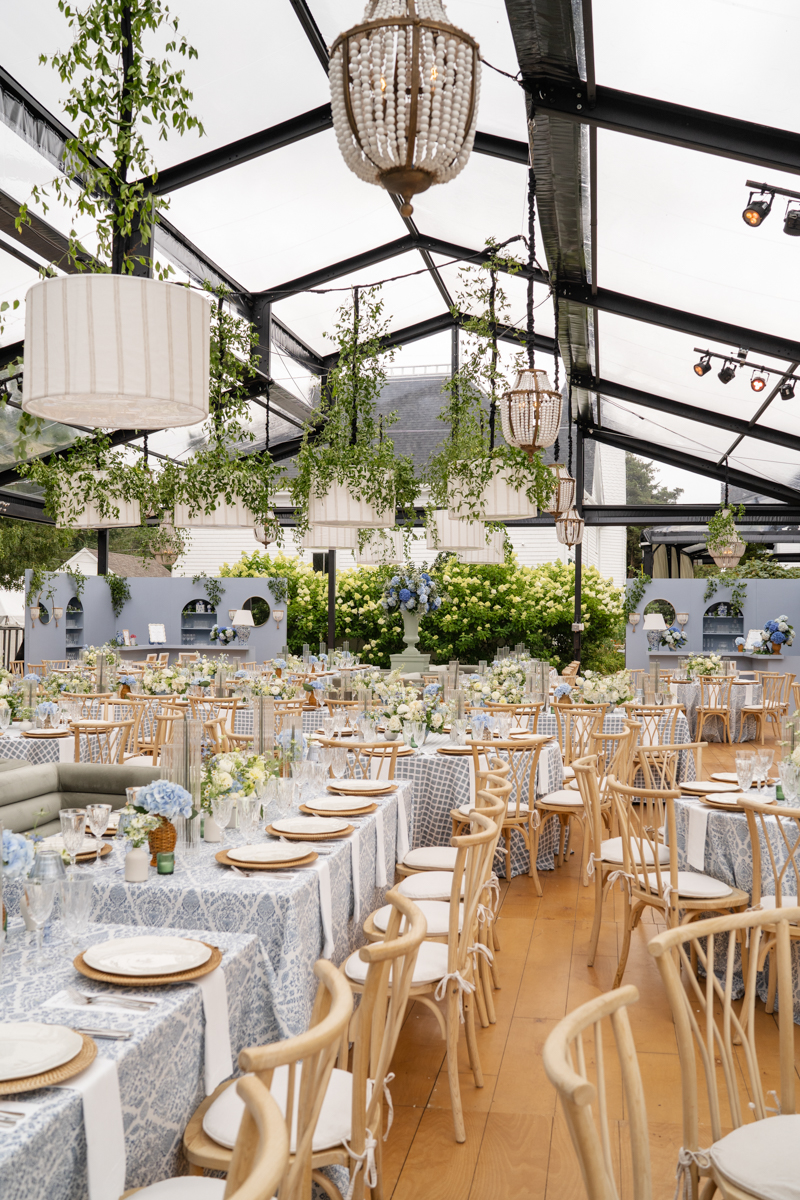 black steal tent wedding structure with cape cod garden aesthetic 