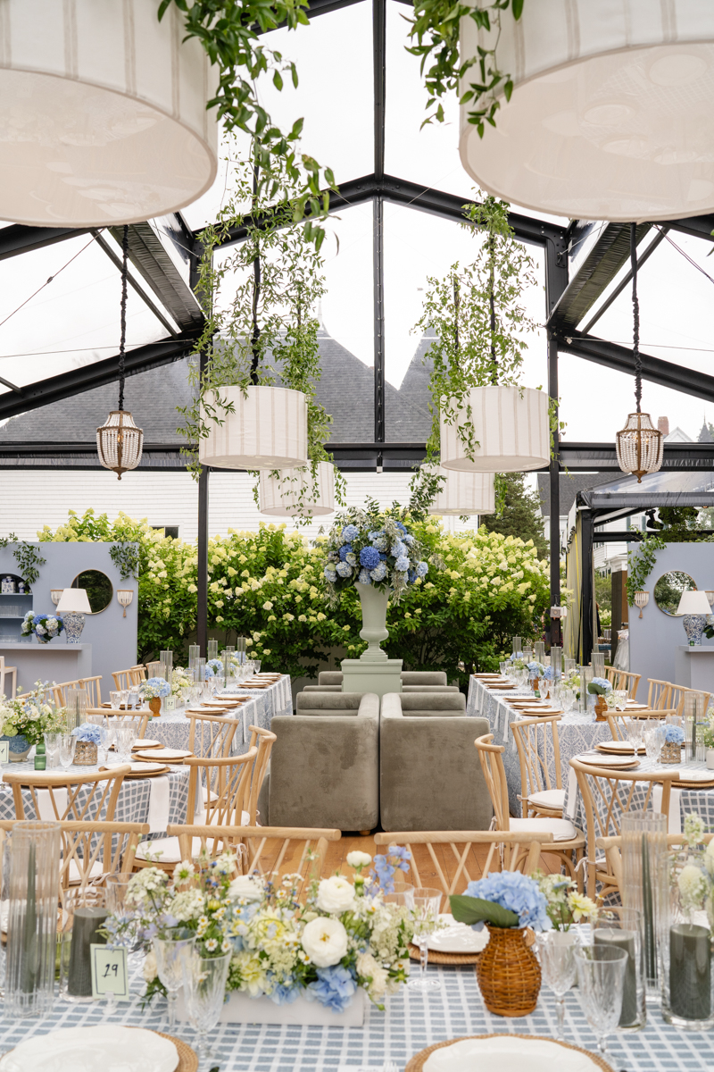 black steal tent wedding structure with cape cod garden aesthetic 