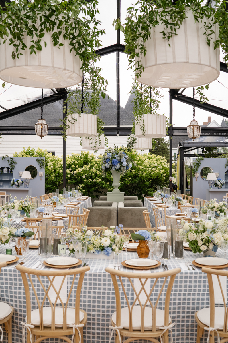 black steal tent wedding structure with cape cod garden aesthetic 