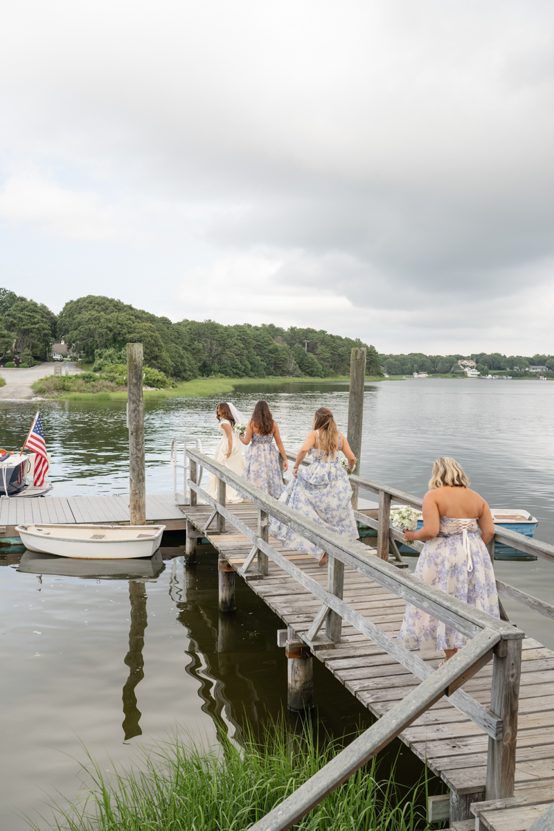 bridal party taking a boat to reception