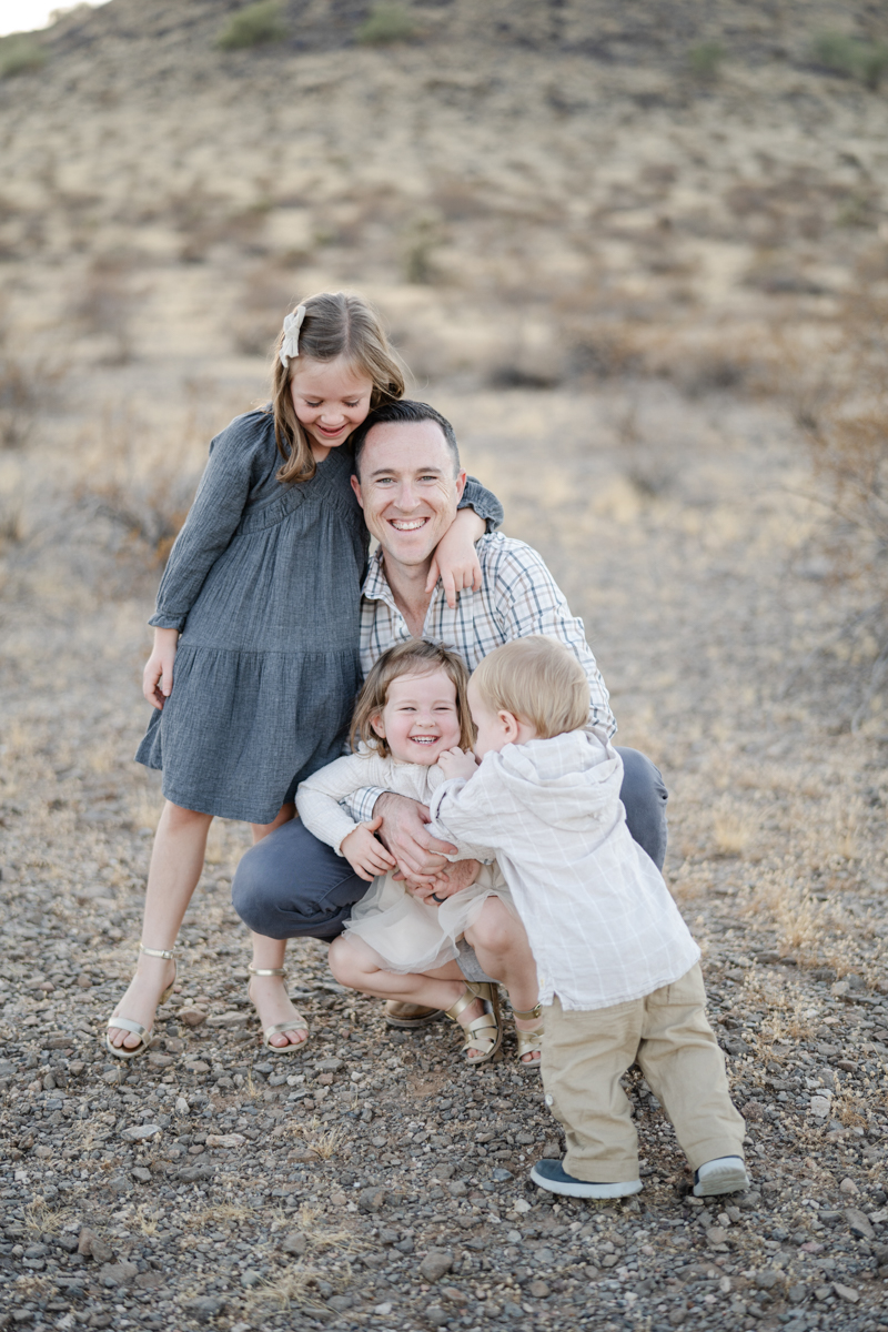 dad with kids in desert