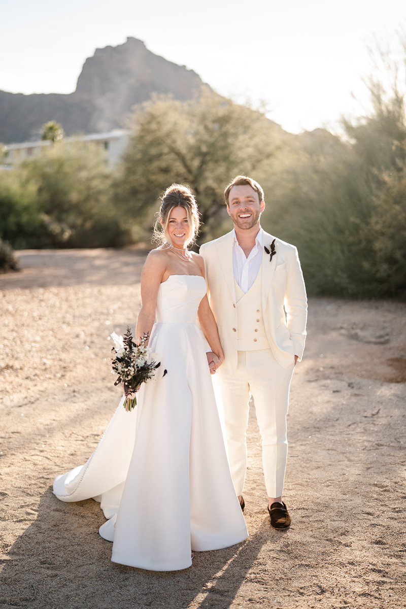 bride and groom in the desert