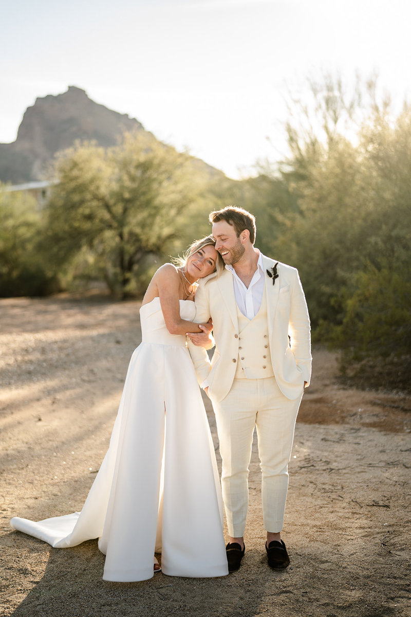 bride and groom in the desert