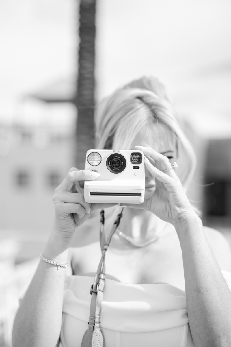 bride shooting a polaroid