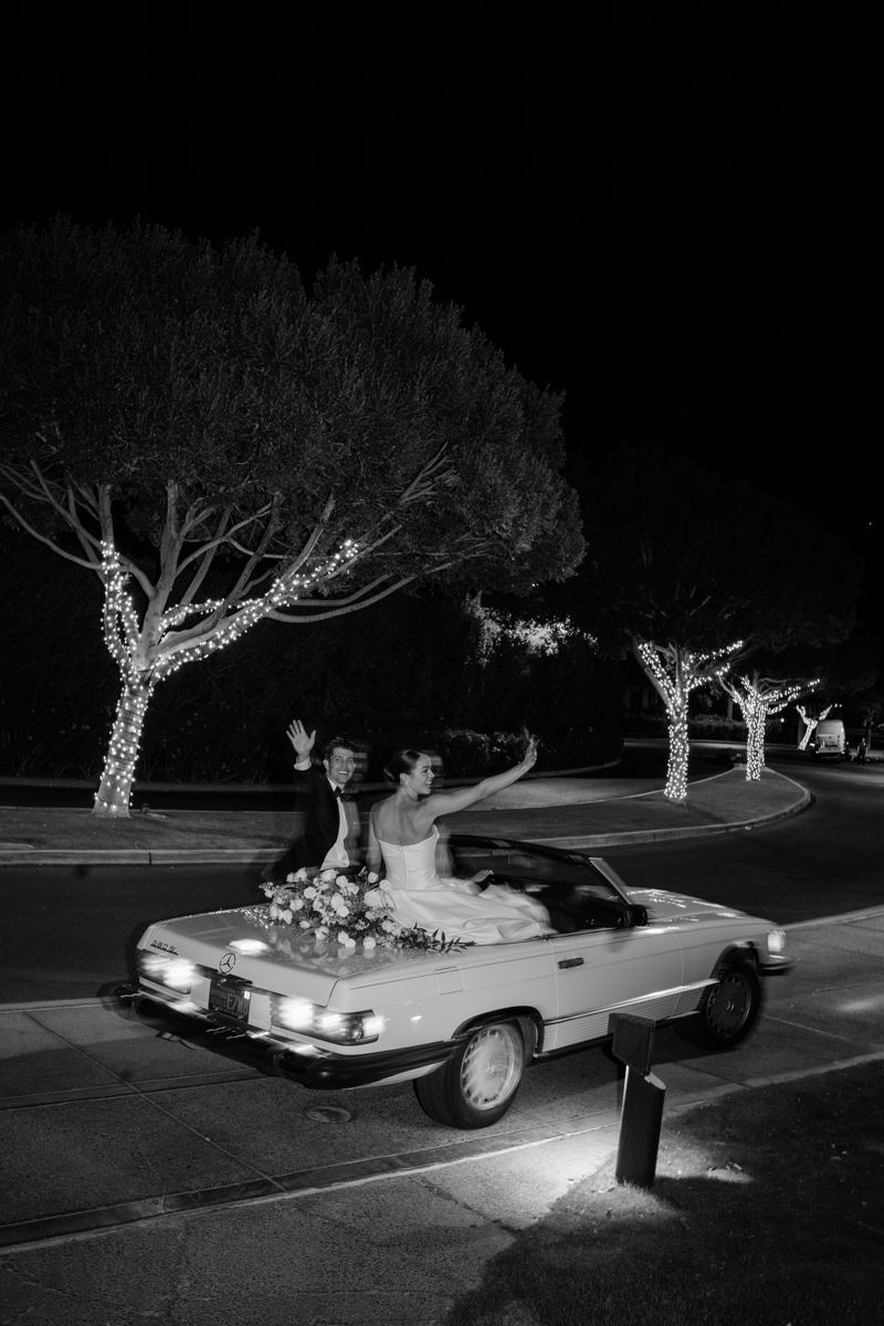 bride and groom in vintage Mercedes