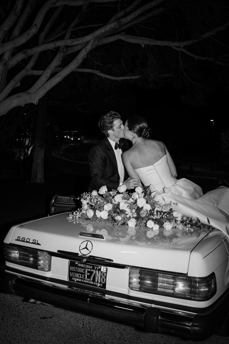 bride and groom in vintage Mercedes