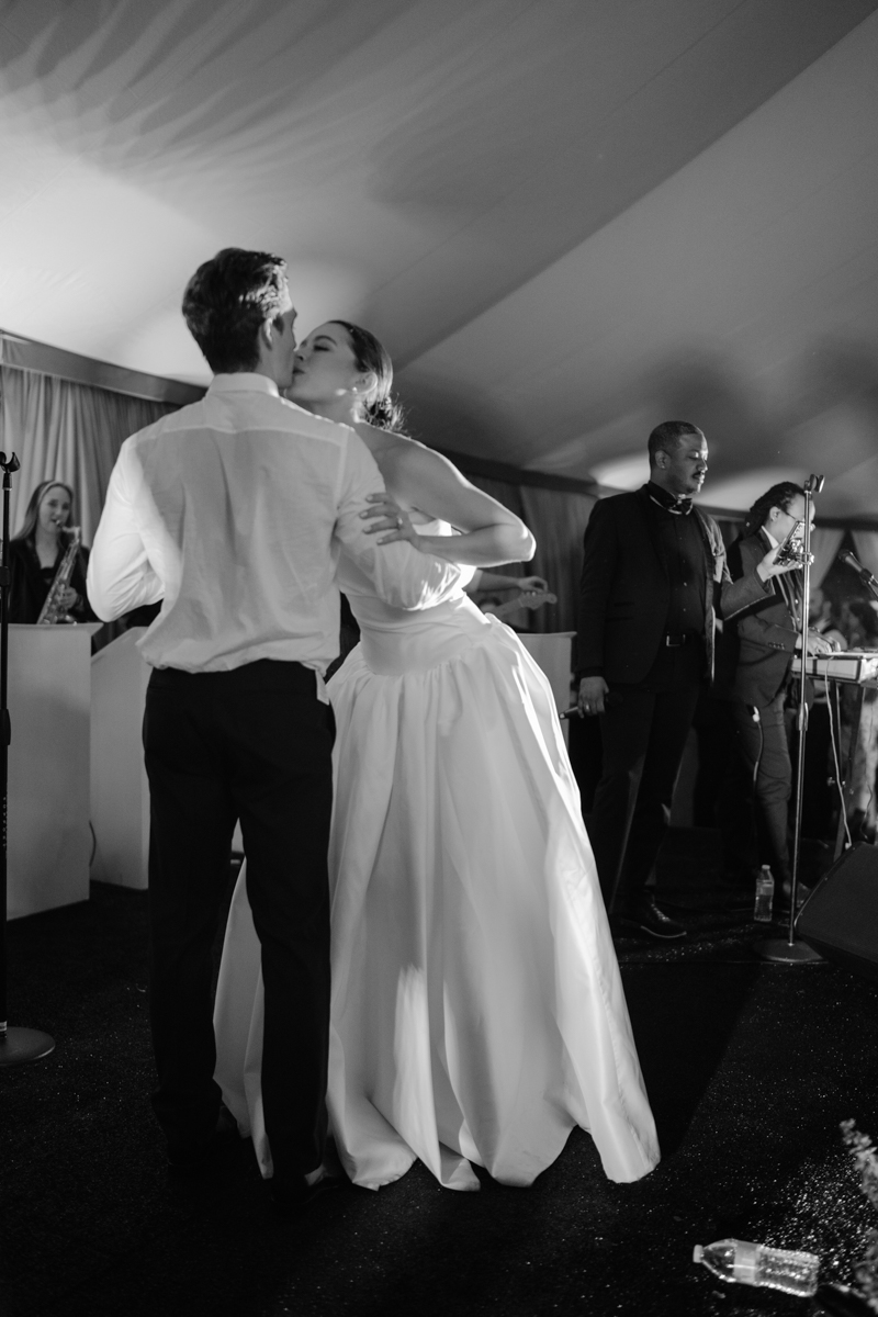 bride and groom singing on stage