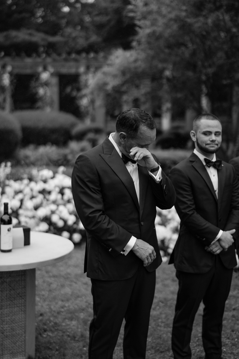 groom crying at ceremony