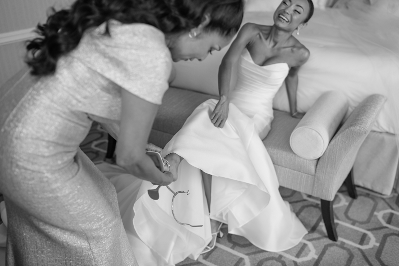 mom helping daughter get ready