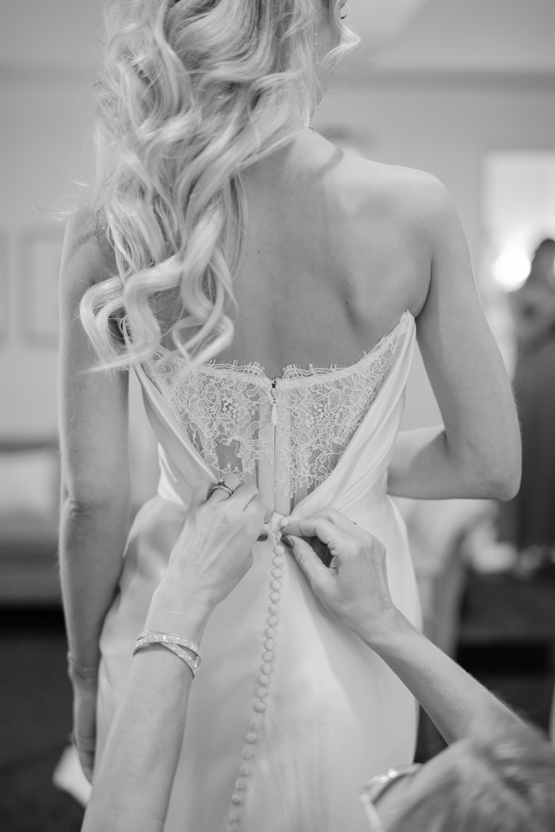 Bride getting dressed